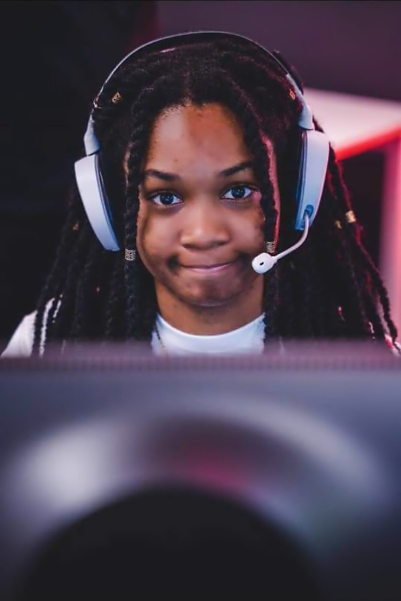 India “Alanis” Browne smiling in a gaming headset