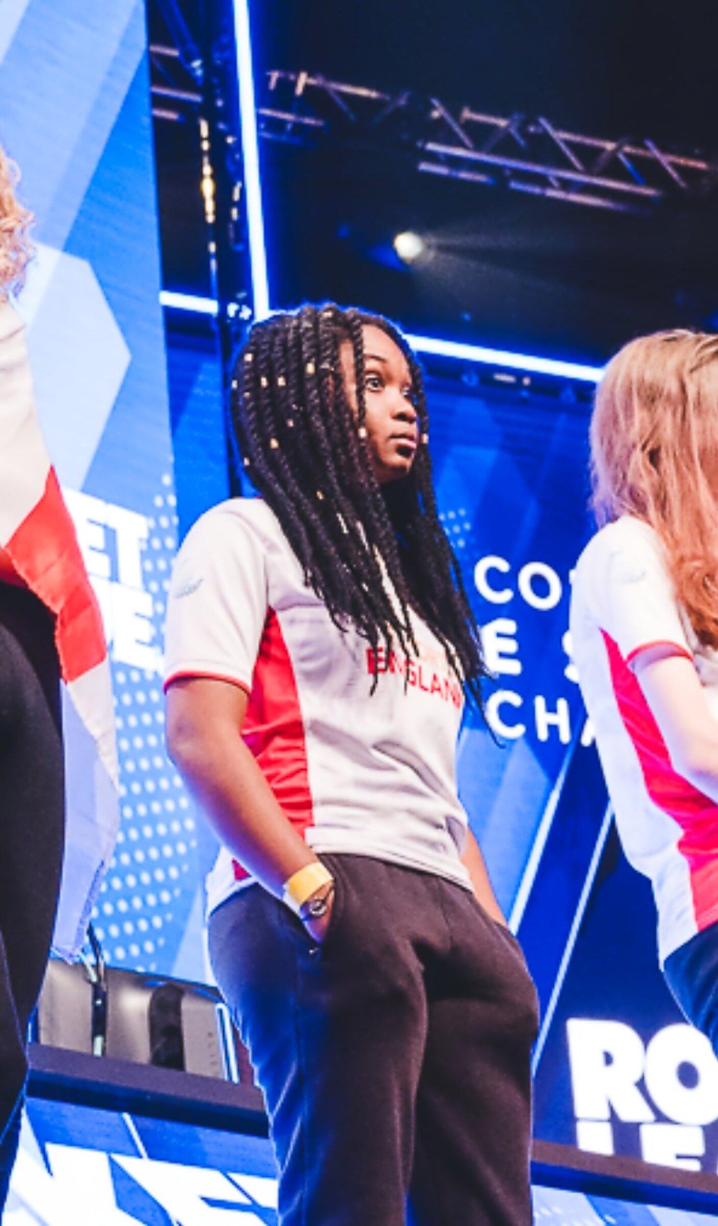 India “Alanis” Browne on stage in her Team England shirt at the Commonwealth Esports Championships